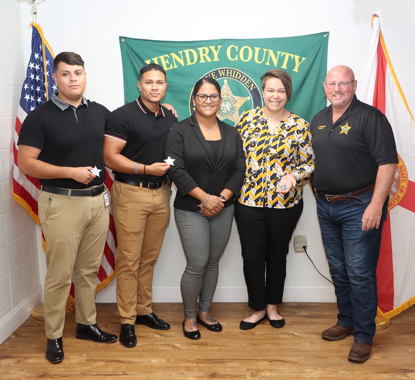 L-R Hendry County Sheriff's Office Deputy Hernan Ramirez Garcia, Deputy Larry Rodriguez, Deputy Dayana Calvo Driggs, Deputy Isabel Rodriguez and Sheriff Steve Whidden.